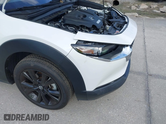 2022 Mazda CX-30 2.5 Turbo Premium Package with VIN 3MVDMBDY3NM437897, listed as a IAAI auction lot 41715776 with 42,771 mi miles. Bid and sale history available at carsss.com. Image 6.
