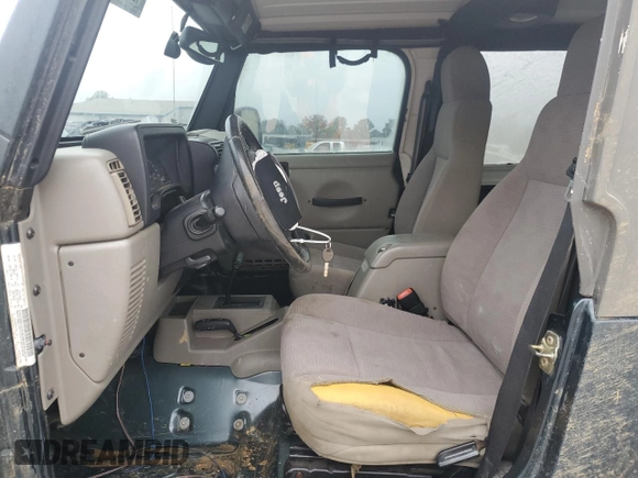 2005 Jeep Wrangler Rubicon with VIN 1J4FA69S95P377014, listed as a Copart auction lot 42676915 with 130,571 mi miles and Salvage Title. Bid and sale history available at carsss.com. Image 7.