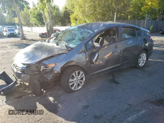 2012 Honda Insight EX z VIN JHMZE2H72CS006248, wystawiony jako Copart lot #73184844 z przebiegiem Nie podano mil oraz Szkoda całkowita • Salvage title. Historia ofert i sprzedaży dostępna na DreamBid. Obrazek 1.