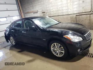 2012 Infiniti M Hybrid with VIN JN1EY1AP7CM910194, listed as a Copart auction lot 72003524 with 124,723 mi miles and Salvage title. Bid and sale history available at DreamBid. Image 4.