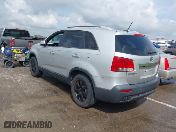 2011 Kia Sorento LX with VIN 5XYKT4A14BG074310, listed as a IAAI auction lot 42119815 with 215,660 mi miles. Bid and sale history available at carsss.com. Image 3.
