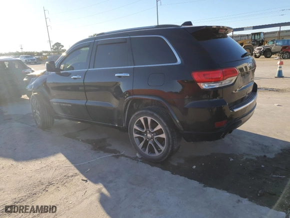 2017 Jeep Grand Cherokee Overland with VIN 1C4RJECGXHC659417, listed as a Copart auction lot 80168894 with 118,934 mi miles and Salvage Title. Bid and sale history available at carsss.com. Image 2.