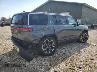 2023 Rivian R1S Adventure z VIN 7PDSGABAXPN010623, wystawiony jako Copart lot #72176294 z przebiegiem Nie podano mil oraz Szkody całkowita. Historia ofert i sprzedaży dostępna na DreamBid. Obrazek 3.