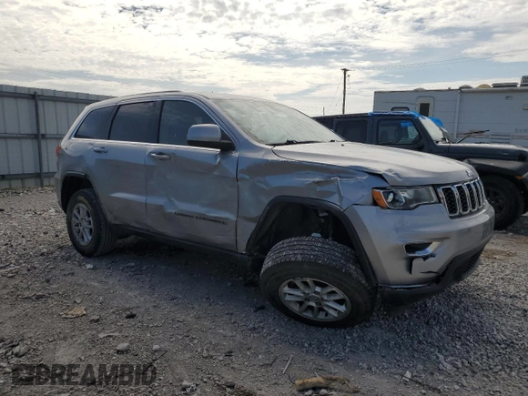 2018 Jeep Grand Cherokee Laredo with VIN 1C4RJFAG4JC122038, listed as a Copart auction lot 54351465 with 101,314 mi miles and Salvage title. Bid and sale history available at DreamBid. Image 4.