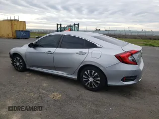 2019 Honda Civic Sedan LX with VIN 19XFC2F61KE200100, listed as a Copart auction lot 37959484 with 131,847 mi miles and Salvage Title. Bid and sale history available at carsss.com. Image 2.