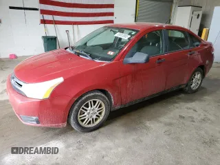 2009 Ford Focus SE z VIN 1FAHP35N49W157826, wystawiony jako Copart lot #55853885 z przebiegiem 228 103 mil mil oraz Czysty tytuł • Clean title. Historia ofert i sprzedaży dostępna na DreamBid. Obrazek 1.