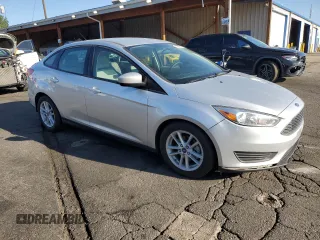 2018 Ford Focus SE z VIN 1FADP3F26JL278091, wystawiony jako Copart lot #63879875 z przebiegiem 81 984 mil mil oraz Czysty tytuł • Clean title. Historia ofert i sprzedaży dostępna na DreamBid. Obrazek 4.