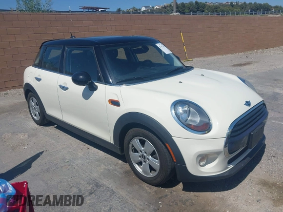 2016 MINI Hardtop 4 Door with VIN WMWXU1C56G2D10605, listed as a IAAI auction lot 42411431 with 35,367 mi miles and . Bid and sale history available at DreamBid. Image 1.