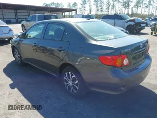 2010 Toyota Corolla with VIN 2T1BU4EE0AC371711, listed as a IAAI auction lot 41784869 with 82,999 mi miles. Bid and sale history available at carsss.com. Image 3.