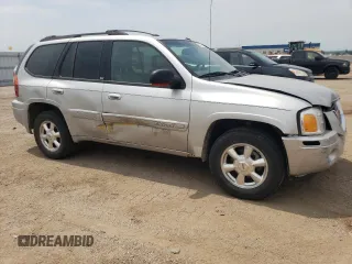 2004 GMC Envoy SLT with VIN 1GKDT13S842439635, listed as a Copart auction lot 63317194 with 201,672 mi miles and Salvage Title. Bid and sale history available at carsss.com. Image 4.