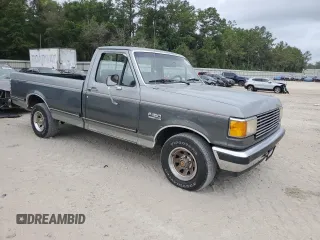 1990 Ford F-150 z VIN 1FTDF15N7LNB38801, wystawiony jako Copart lot #59738475 z przebiegiem 273 718 mil mil oraz Czysty tytuł • Clean title. Historia ofert i sprzedaży dostępna na DreamBid. Obrazek 4.