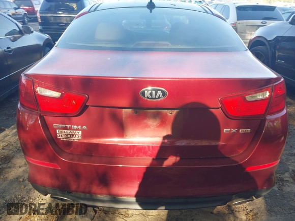 2015 Kia Optima EX with VIN 5XXGN4A70FG385182, listed as a IAAI auction lot 42005000 with 199,417 mi miles. Bid and sale history available at carsss.com. Image 16.