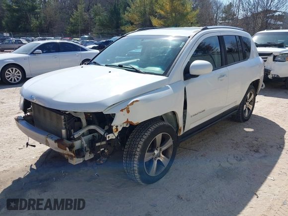2016 Jeep Compass High Altitude with VIN 1C4NJDEB4GD767731, listed as a IAAI auction lot 41977400 with 99,890 mi miles and . Bid and sale history available at DreamBid. Image 22.