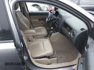 2011 Jeep Compass Limited with VIN 1J4NF5FB9BD258484, listed as a IAAI auction lot 41790636 with 136,679 mi miles. Bid and sale history available at carsss.com. Image 5.