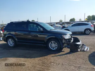 2013 Dodge Journey SXT with VIN 3C4PDCBG7DT710844, listed as a IAAI auction lot 40582910 with 136,741 mi miles and . Bid and sale history available at DreamBid. Image 13.