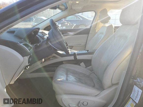 2014 Lincoln MKZ Hybrid z VIN 3LN6L2LU8ER825265, wystawiony jako Copart lot #49480805 z przebiegiem 138 746 mil mil oraz Szkoda całkowita • Salvage title. Historia ofert i sprzedaży dostępna na DreamBid. Obrazek 7.