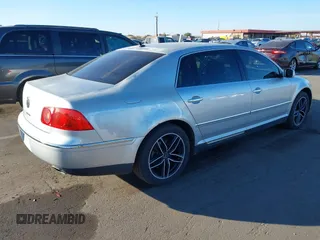 2004 Volkswagen Phaeton V8 z VIN WVWAF63D048009292, wystawiony jako IAAI lot #41204597 z przebiegiem 149 623 mil mil oraz . Historia ofert i sprzedaży dostępna na DreamBid. Obrazek 4.