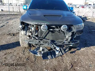 2018 Dodge Durango SRT z VIN 1C4SDJGJ1JC415720, wystawiony jako IAAI lot #41193674 z przebiegiem 63 140 mil mil oraz . Historia ofert i sprzedaży dostępna na DreamBid. Obrazek 6.