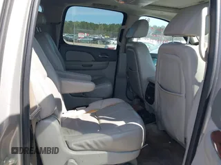 2007 Chevrolet Suburban LS with VIN 1GNFC16087J239886, listed as a IAAI auction lot 41874548 with 303,014 mi miles and . Bid and sale history available at DreamBid. Image 8.