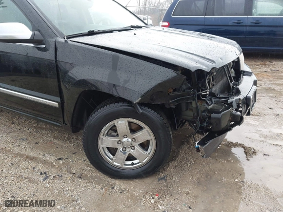 2006 Jeep Grand Cherokee Overland with VIN 1J8HR68296C308382, listed as a IAAI auction lot 41466673 with 167,028 mi miles. Bid and sale history available at carsss.com. Image 13.