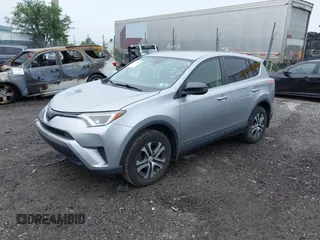 2018 Toyota RAV4 LE with VIN JTMBFREV8JJ200930, listed as a IAAI auction lot 42524876 with 88,015 mi miles and . Bid and sale history available at DreamBid. Image 2.