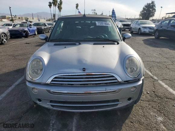 2006 MINI Cooper Convertible with VIN WMWRF33556TG15049, listed as a Copart auction lot 73201804 with 131,216 mi miles and Salvage Title. Bid and sale history available at carsss.com. Image 5.