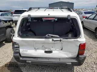 1998 Jeep Grand Cherokee Laredo with VIN 1J4GZ58S4WC244954, listed as a Copart auction lot 55731465 with 205,766 mi miles and Salvage title. Bid and sale history available at DreamBid. Image 6.