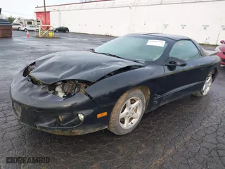 2000 Pontiac Firebird with VIN 2G2FS22K7Y2140141, listed as a IAAI auction lot 41219773 with 1 mi miles. Bid and sale history available at carsss.com. Image 2.