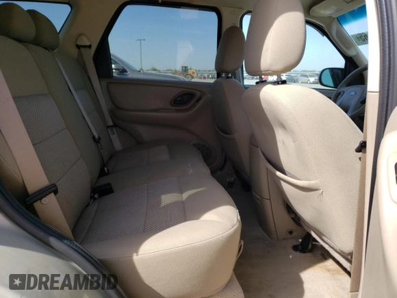 2005 Ford Escape XLT with VIN 1FMYU93105KC50944, listed as a Copart auction lot 50500965 with 133,532 mi miles and Salvage Title. Bid and sale history available at DreamBid. Image 11.