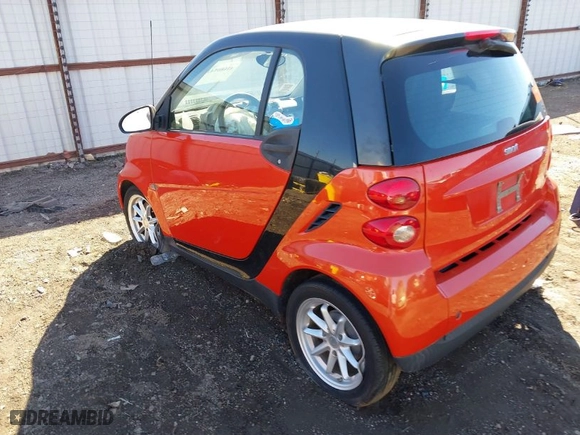 2008 Smart fortwo Pure with VIN WMEEJ31X28K122571, listed as a IAAI auction lot 41680541 with 63,673 mi miles. Bid and sale history available at carsss.com. Image 3.