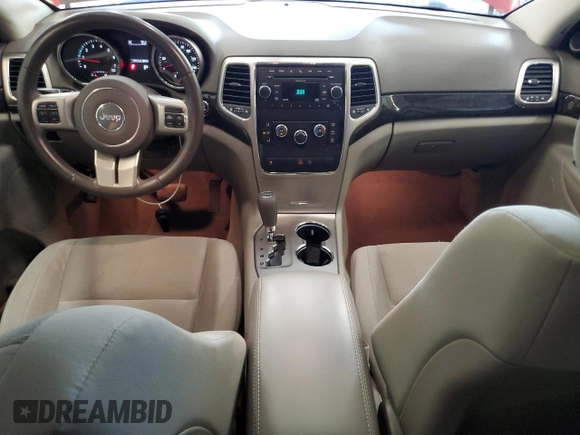 2011 Jeep Grand Cherokee Laredo with VIN 1J4RR4GG3BC669561, listed as a Copart auction lot 63627395 with 99,211 mi miles and Salvage title. Bid and sale history available at DreamBid. Image 8.