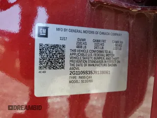 2018 Chevrolet Impala LT z VIN 2G1105S35J9138061, wystawiony jako Copart lot #57300635 z przebiegiem 133 601 mil mil oraz Szkoda całkowita • Salvage title. Historia ofert i sprzedaży dostępna na DreamBid. Obrazek 13.