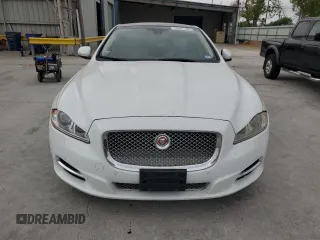 2014 Jaguar XJ Portfolio with VIN SAJWJ2GD6E8V65987, listed as a Copart auction lot 50091105 with 136,080 mi miles and Clean title. Bid and sale history available at DreamBid. Image 5.