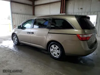 2013 Honda Odyssey LX with VIN 5FNRL5H27DB076212, listed as a Copart auction lot 52856615 with 123,096 mi miles and Salvage Title. Bid and sale history available at carsss.com. Image 2.