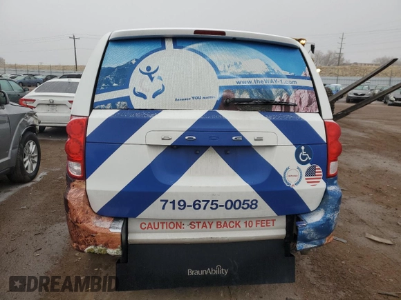 2019 Dodge Grand Caravan SXT with VIN 2C7WDGCG9KR698183, listed as a Copart auction lot 42908394 with 115,950 mi miles and Salvage Title. Bid and sale history available at DreamBid. Image 6.