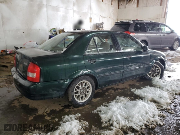 1999 Mazda Protege DX z VIN JM1BJ2220X0108600, wystawiony jako Copart lot #77004894 z przebiegiem 220 836 mil mil oraz Szkoda całkowita • Salvage title. Historia ofert i sprzedaży dostępna na DreamBid. Obrazek 3.