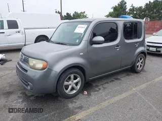 2010 Nissan Cube S z VIN JN8AZ2KR9AT153627, wystawiony jako IAAI lot #42352451 z przebiegiem 184 305 mil mil oraz . Historia ofert i sprzedaży dostępna na DreamBid. Obrazek 2.