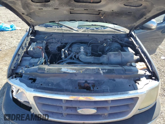2003 Ford F-150 XL with VIN 1FTRF17203NA88672, listed as a Copart auction lot 49455585 with 471,132 mi miles and Salvage Title. Bid and sale history available at DreamBid. Image 11.