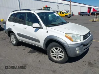 2001 Toyota RAV4 with VIN JTEGH20V610012097, listed as a IAAI auction lot 42652021 with 168,152 mi miles and . Bid and sale history available at DreamBid. Image 1.