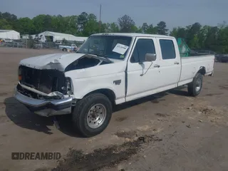 1996 Ford F-350 with VIN 1FTJW35F8TEA09134, listed as a IAAI auction lot 42120588 with 363,876 mi miles and . Bid and sale history available at DreamBid. Image 2.