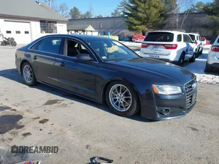 2017 Audi A8 L Sport with VIN WAU43AFDXHN003685, listed as a IAAI auction lot 41264314 with 114,828 mi miles. Bid and sale history available at carsss.com. Image 1.