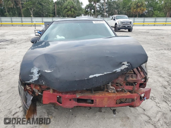 1997 Ford Thunderbird LX z VIN 1FALP62W7VH165149, wystawiony jako Copart lot #56654715 z przebiegiem 155 190 mil mil oraz Szkody całkowita. Historia ofert i sprzedaży dostępna na DreamBid. Obrazek 5.
