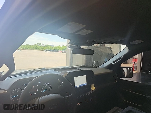 2023 Ford F-150 XL with VIN 1FTEX1EP1PKD56789, listed as a IAAI auction lot 42802275 with 52,497 mi miles and . Bid and sale history available at DreamBid. Image 4.