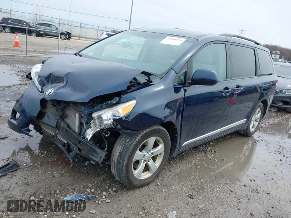 2011 Toyota Sienna LE AAS with VIN 5TDKK3DC4BS094456, listed as a IAAI auction lot 41956894 with 176,882 mi miles. Bid and sale history available at carsss.com. Image 2.