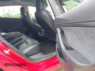 2020 Tesla Model 3 Standard Range Plus z VIN 5YJ3E1EA0LF611657, wystawiony jako IAAI lot #42046234 z przebiegiem 122 557 mil mil oraz . Historia ofert i sprzedaży dostępna na DreamBid. Obrazek 8.