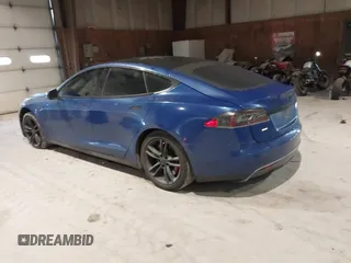 2014 Tesla Model S 60 with VIN 5YJSA1H1XEFP30497, listed as a IAAI auction lot 41294630 with 203,663 mi miles and . Bid and sale history available at DreamBid. Image 3.