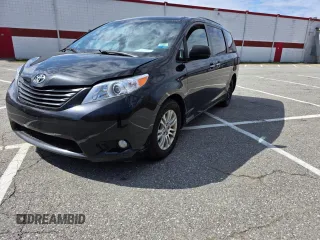 2015 Toyota Sienna XLE with VIN 5TDYK3DC2FS677415, listed as a Copart auction lot 54703175 with 275,971 mi miles and Clean Title. Bid and sale history available at carsss.com. Image 2.