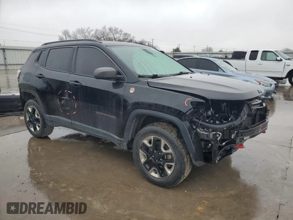 2018 Jeep Compass Trailhawk with VIN 3C4NJDDB6JT456305, listed as a Copart auction lot 44175405 with 124,636 mi miles and Salvage Title. Bid and sale history available at carsss.com. Image 4.