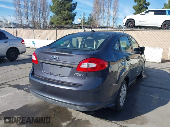 2012 Ford Fiesta S with VIN 3FADP4AJXCM187721, listed as a IAAI auction lot 41269984 with 118,474 mi miles. Bid and sale history available at carsss.com. Image 4.