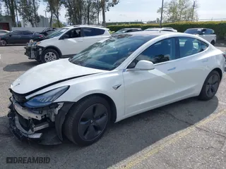 2018 Tesla Model 3 Long Range Battery with VIN 5YJ3E1EA8JF162130, listed as a IAAI auction lot 41933015 with 50,081 mi miles. Bid and sale history available at carsss.com. Image 21.